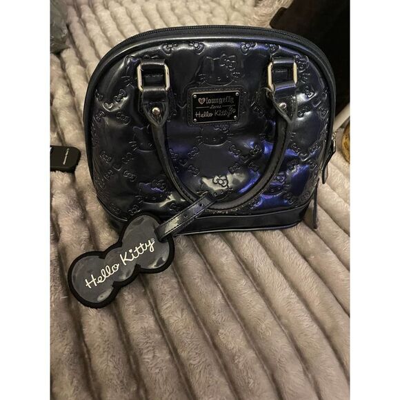 Loungefly Handbags - Hello kitty x loungefly metallic grey/blue de satchel